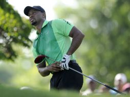 Las lesiones, la edad y las operaciones podrían haber hecho pensar a Tiger en el retiro. AP /