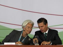 Peña Nieto coincide con Lagarde que al finalizar las reformas, los mexicanos podrán vivir sus sueños y hacerlos realidad. AP /