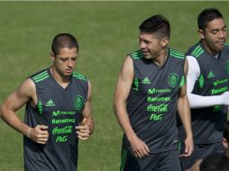 'Chicharito' Hernández, Peralta y Marco Fabián se preparan para el encuentro ante Holanda. AP /