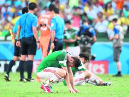 La Selección nacional dirigida por Miguel Herrera no pudo romper la maldición de octavos de final al quedar eliminados de Brasil 2014. AFP /