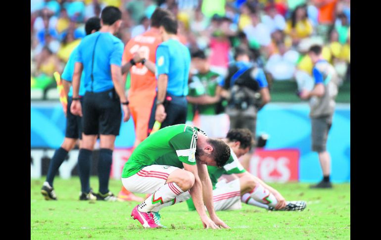 La Selección nacional dirigida por Miguel Herrera no pudo romper la maldición de octavos de final al quedar eliminados de Brasil 2014. AFP /