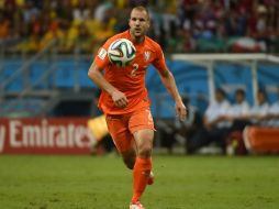 A tres días del encuentro contra Argentina, Vlaar presenta problemas físicos. AFP /