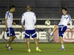 Di María, Mascherano y Messi durante el entrenamiento de la Selección argentina. AFP /