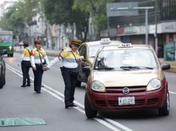 Un grupo de Ecoguardas realizan labores de vigilancia ambientan y de orientación a automovilistas. ARCHIVO /