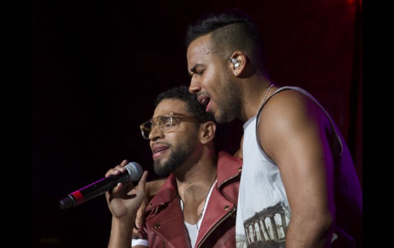 El estadio enloqueció cuando Lenny, Max y Henry aparecieron en el gigantesco escenario para unirse a Romeo. EFE /