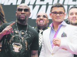 Se encuentran de nuevo. Mayweather Jr. y Maidana estuvieron frente a frente por primera vez desde el pasado 3 de mayo. AFP /