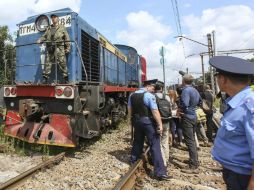 El vehículo que transportaba los cuerpos llega a Jarkov, en el este de Ucrania. EFE /