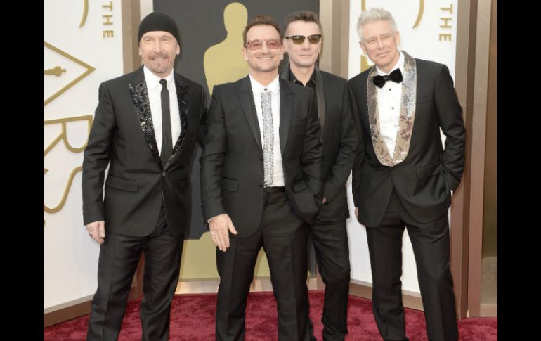 The Edge, Bono, Larry Mullen y Adam Clayton en los Premios Oscar. ARCHIVO /