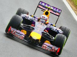 Ricciardo finalizó primero en una de las mejores carreras de la temporada 2014. AFP /