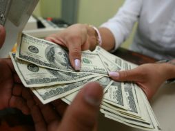 El dólar muestra una disminución de 2.06 por ciento en lo que va de la semana. ARCHIVO /