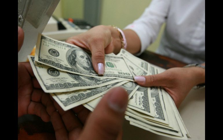 El dólar muestra una disminución de 2.06 por ciento en lo que va de la semana. ARCHIVO /