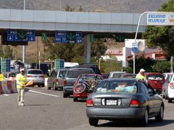 En un periodo no mayor de seis meses, por primera ocasión, los automovilistas podrán circular con una sola tarjeta de pago. ARCHIVO /