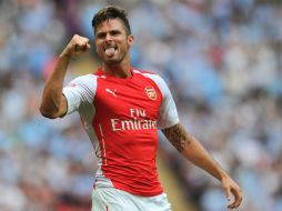 Giroud festeja el tercer tanto, que da la CM número 13 para el cuadro londinense. AFP /