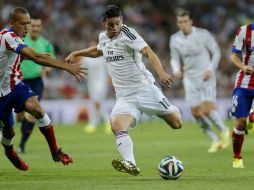 Al minuto 80, el Real Madird se puso al frente del marcador por conducto del colombiano James Rodríguez. AP /