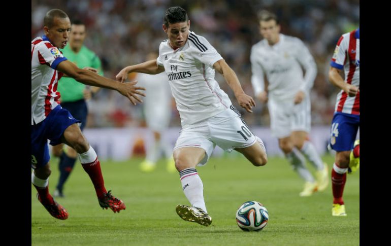 Al minuto 80, el Real Madird se puso al frente del marcador por conducto del colombiano James Rodríguez. AP /