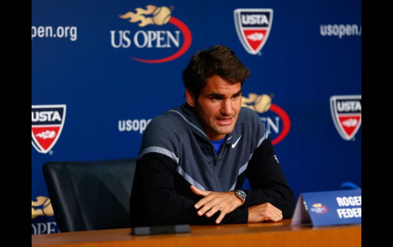 Federer vive un renacer deportivo, siendo el 2014 cuando más triunfos ha conseguido. AFP /