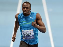 Los entrenamientos de Bolt se han visto perturbados este año por una lesión. AFP /