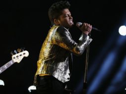 Bruno Mars, un ''hooligan'' musical que estará muy pronto en el país para ''voltearlo'' de cabeza. ARCHIVO /