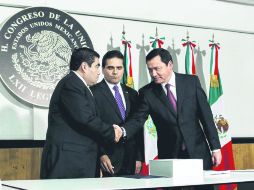 El secretario de Gobernación, Miguel Ángel Osorio Chong, durante la entrega del II informe de Enrique Peña Nieto.  /