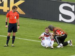 Christoph Kramer es atendido durante la final del Mundial en julio pasado. MEXSPORT /