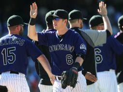 Dickerson llevó a los Rockies a la victoria al proceder con su segundo vuelacercas del juego. AP /