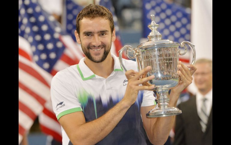 Cilic, de 25 años y 14º sembrado del torneo, se convirtió en el primer tenista de su país en ganar el torneo. EFE  J. Lane.  /