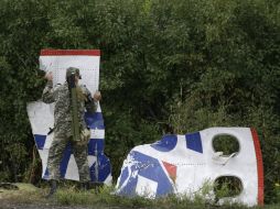 El vuelo MH17 sobrevolaba un espacio aéreo sin restricciones cuando sufrió el accidente. AP S. Grits  /