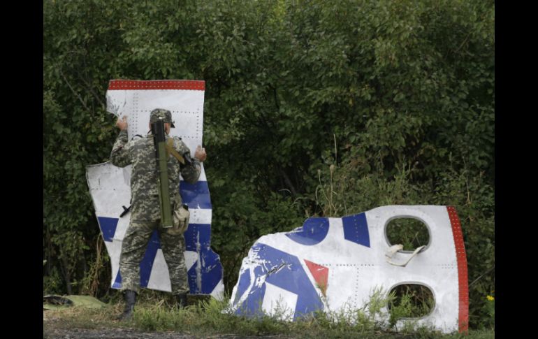 El vuelo MH17 sobrevolaba un espacio aéreo sin restricciones cuando sufrió el accidente. AP S. Grits  /