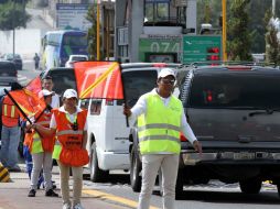 Durante este operativo se llevarán a cabo medidas para agilizar el cruce de vehículos por las plazas de cobro. EL INFORMADOR ARCHIVO /