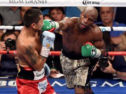 Mayweather controló la pelea a partir del cuarto episodio ante Maidana. AFP E.Miller  /