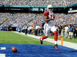 Ted Ginn Jr. devolvió 71 yardas un despeje para el touchdown de la ventaja en el cuarto periodo. AFP  R. Antonelli.  /