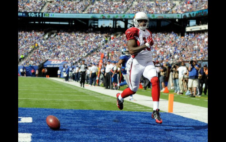 Ted Ginn Jr. devolvió 71 yardas un despeje para el touchdown de la ventaja en el cuarto periodo. AFP  R. Antonelli.  /