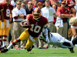 El mariscal Robert Griffin III se lesiona en el primer cuarto. AFP  R. Carr  /