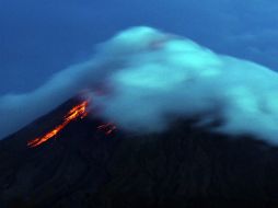 El magma continúa ascendiendo a la superficie, aunque por el momento el nivel de alerta se mantendrá en tres. AFP C. Sayat  /