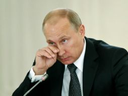 Putin declara que con las sanciones algunos socios comerciales del Rusia abandonaron los principios de la OMC. AFP M. Shemetov  /