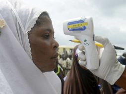 Las medidas de prevención y control en los países afectados deben ser fortalecidas, asegura la OMS. AFP P. Utomi  /