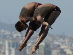 Germán Sánchez e Iván García buscarán su lugar. AFP  ARCHIVO.  /