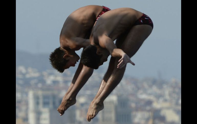 Germán Sánchez e Iván García buscarán su lugar. AFP  ARCHIVO.  /