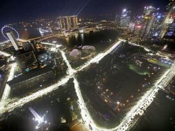 La temporada pasada el GP de Singapur fue ganada por Sebastian Vettel, pero ahora el alemán no es la figura dominante. AP  M. Wong  /