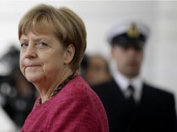 ''Ahora digo que respeto el resultado y lo digo con una sonrisa'', señala Angela Merkel. AP M. Sohn  /