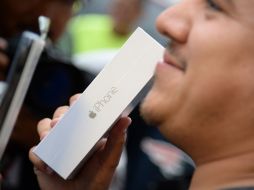 La cifra supera los nueve millones de iPhones que Apple vendió el año pasado del iPhone 5.  AFP R. Beck  /