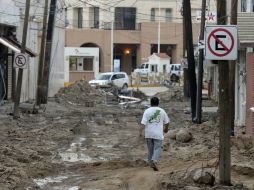 Vista de una calle afectada por 'Odile' en Cabo San Lucas. AFP / ARCHIVO