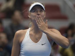 Sharapova confirmó su presencia en cuartos de final con un gran juego. AFP / F. Dufour