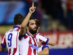 Arda Turan, es el artífice del gol en el minuto 75, dándole la victoria a Los Colchoneros. AFP / J. Soriano.