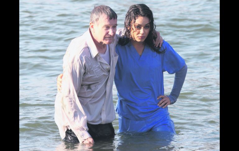 Williams y Kunis. Aquí, en el rodaje de las escenas de 'The angriest man in Brooklyn'. ESPECIAL / nydailynews.com