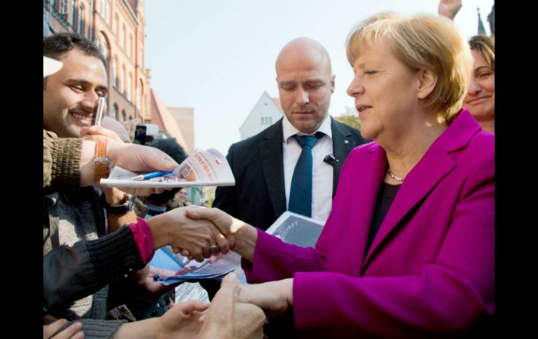 El discurso de Angela Merkel encabeza la ceremonia del Día de la Unidad celebrada en Hannover. AFP / J. Stratenschulte