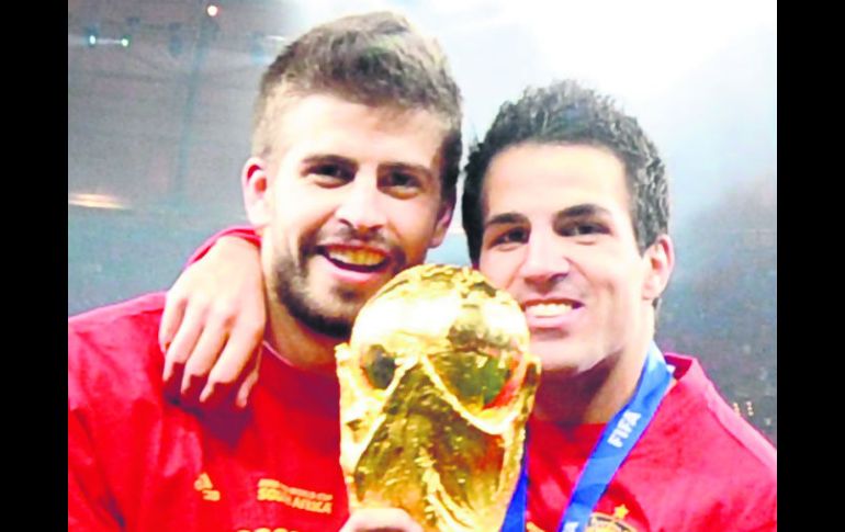 Gerard Piqué y Cesc Fábregas se cubrieron de gloria en Sudáfrica 2010. AFP /