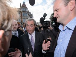 El líder del partido Ukip, Nigel Farage, entra el jueves por primera vez al parlamento. AFP / L. Neal