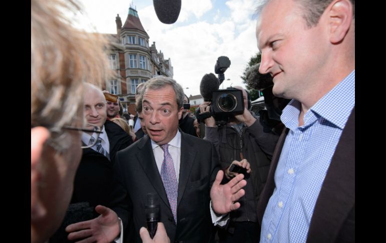 El líder del partido Ukip, Nigel Farage, entra el jueves por primera vez al parlamento. AFP / L. Neal