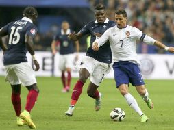 Pogba se enfrenta a Ronaldo en el encuentro amistoso de esta tarde. EFE / M. Cruz